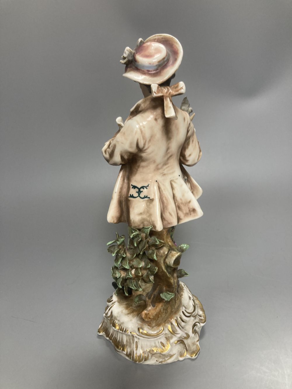 A pair of Wessel Frankenthal figures, 26cm, and a French bisque gallant, 29cm